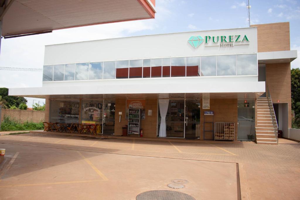 a pucka store with a sign on the front of it at Pureza Hotel in Timon