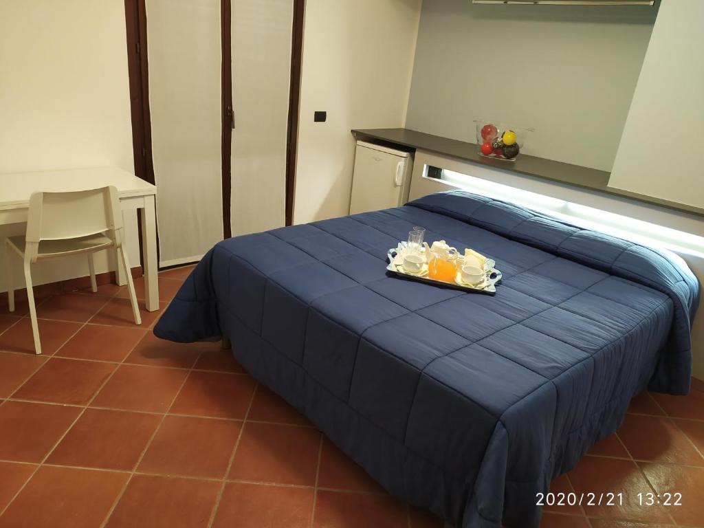 Letto o letti in una camera di L'Albicocco