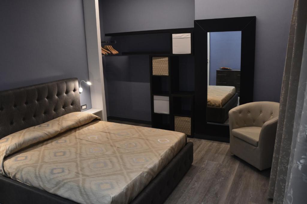 A bed or beds in a room at Luxury Bellevue Centro Città