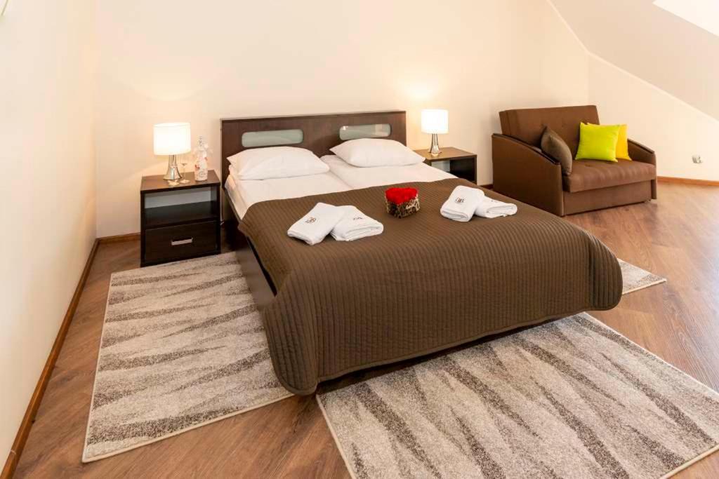 Cama o camas de una habitación en Dom Grinholc