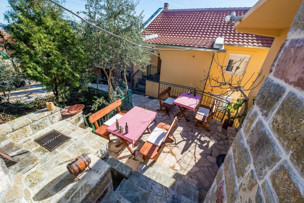 an overhead view of a patio with a table and chairs at Skadar lake Apartments Pajovic in Virpazar