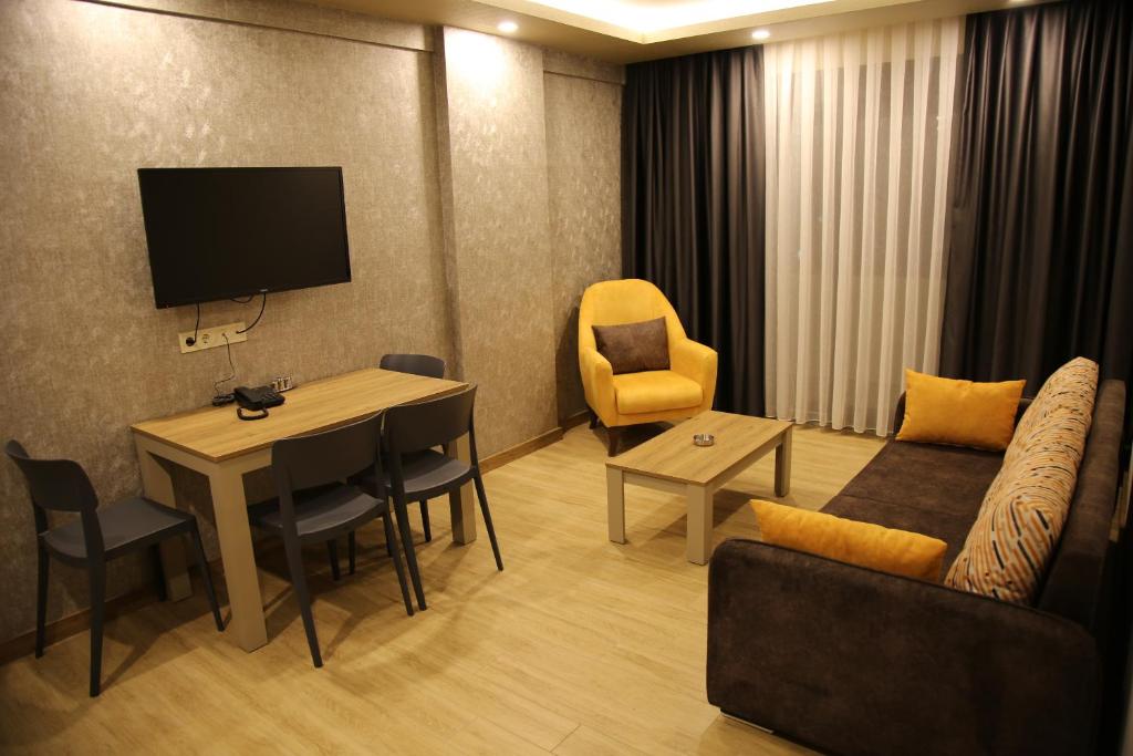 Posezení v ubytování Golden World Suite Hotel