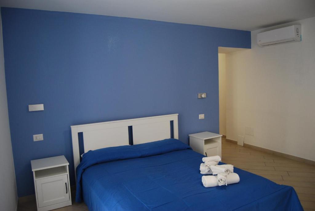 Postel nebo postele na pokoji v ubytování Historic Center Suite