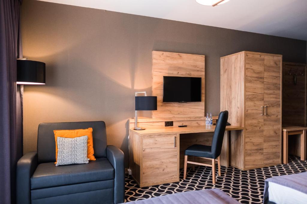 TV a/nebo společenská místnost v ubytování Hotel Coloseum