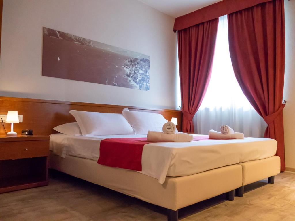 Postel nebo postele na pokoji v ubytování Hotel Venezia Park - ENJOY HOLIDAY