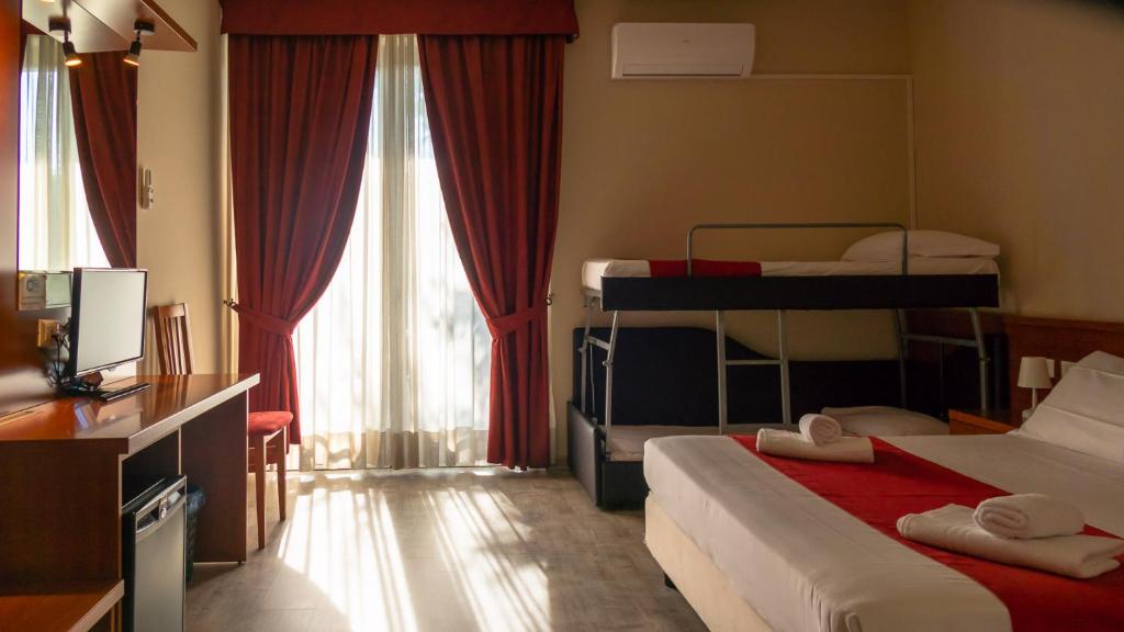 Postel nebo postele na pokoji v ubytování Hotel Venezia Park - ENJOY HOLIDAY