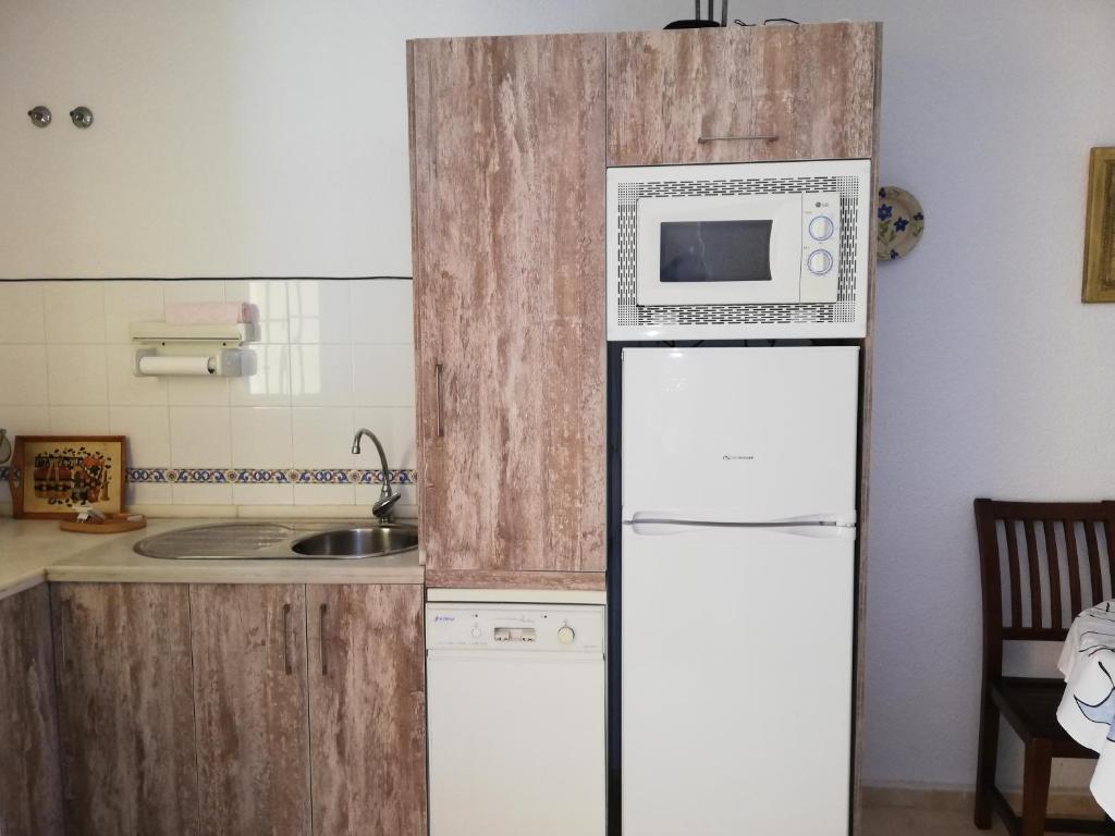 Kuchyň nebo kuchyňský kout v ubytování Apartamento Green Golf Islantilla