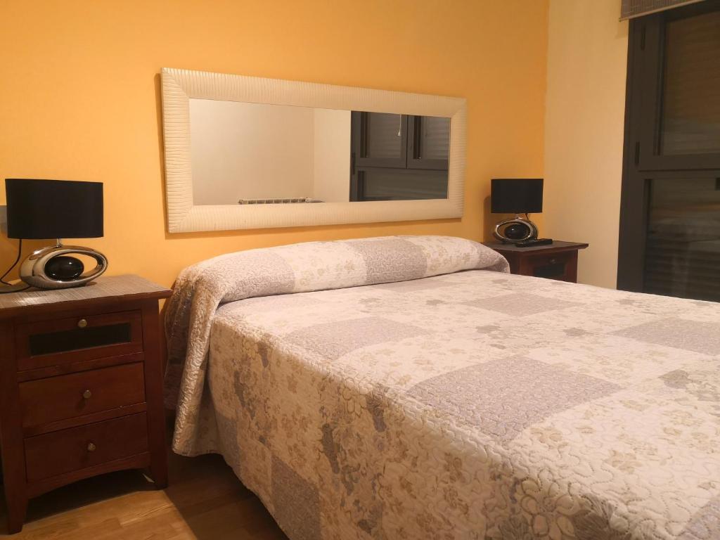 Cama o camas de una habitación en Apartamentos Chevere Naranja