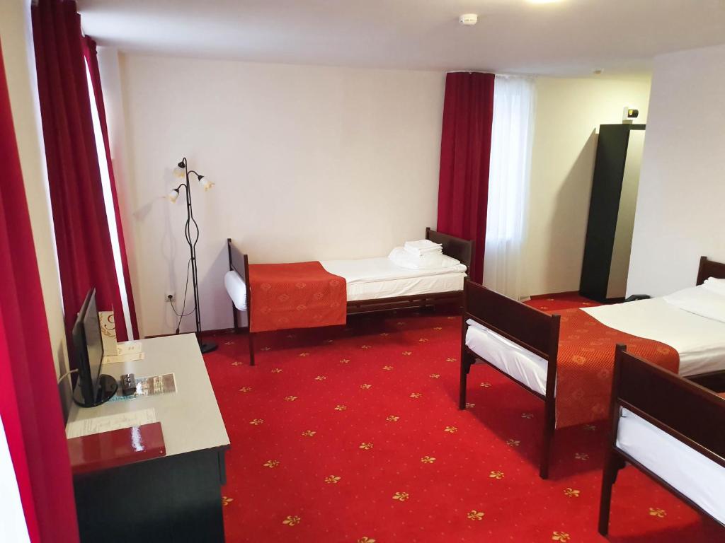 Postel nebo postele na pokoji v ubytování AMAKS Safar Hotel