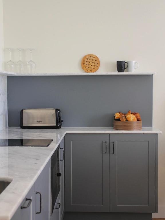 A kitchen or kitchenette at Hotel Boutique Astorga