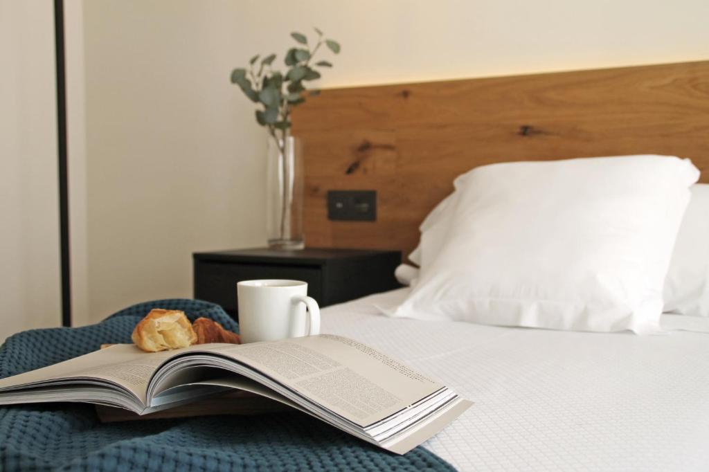 Cama o camas de una habitación en Hotel Boutique Astorga