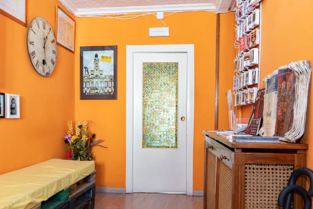 Postel nebo postele na pokoji v ubytování Hostal Rober