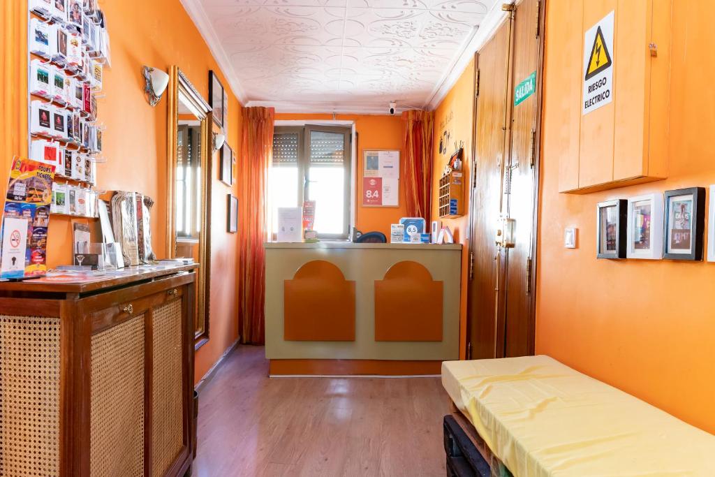 Postel nebo postele na pokoji v ubytování Hostal Rober