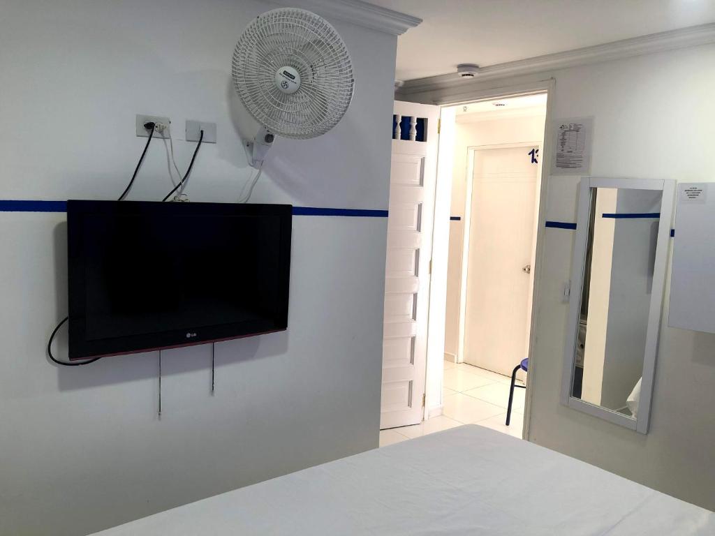 TV a/nebo společenská místnost v ubytování Casa Hotel Manco Mora