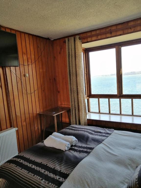 Postel nebo postele na pokoji v ubytování Laguneclub - Su casa de campo