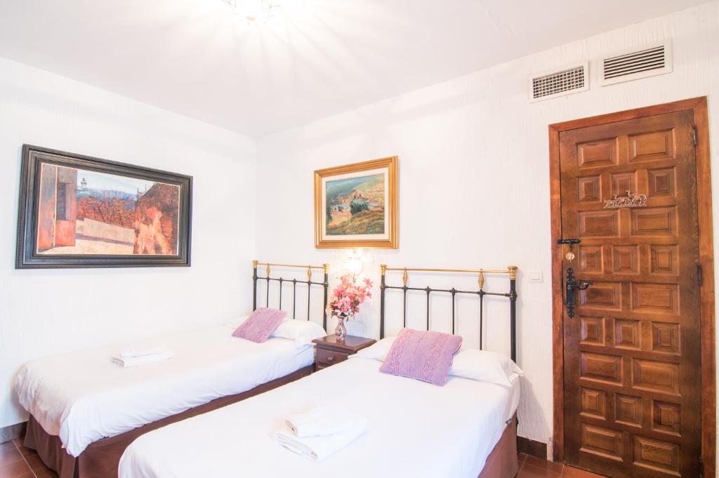 Postel nebo postele na pokoji v ubytování Country House Monachil