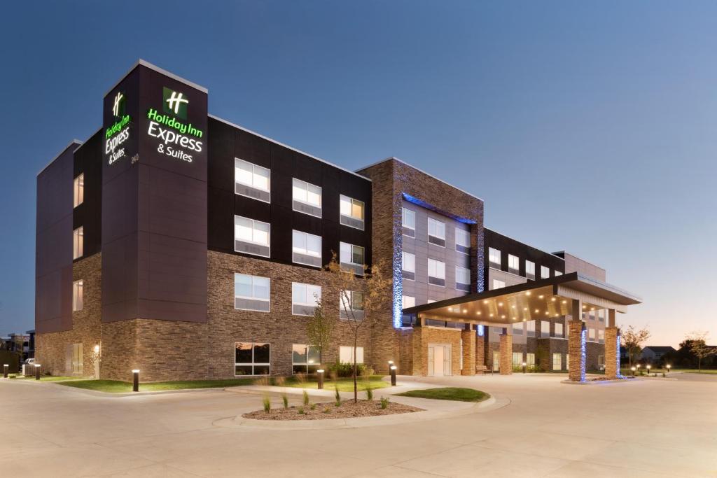 a rendering of the exterior of a hotel at Holiday Inn Express & Suites - West Des Moines - Jordan Creek, an IHG Hotel in West Des Moines