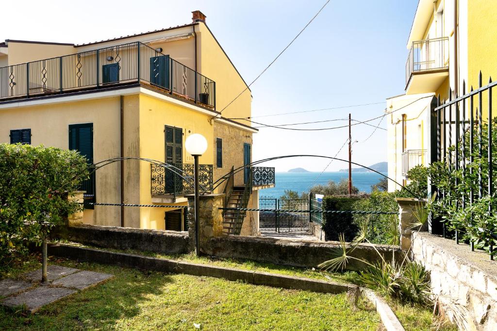 a house with a view of the ocean at Apartments Tellaro in Tellaro