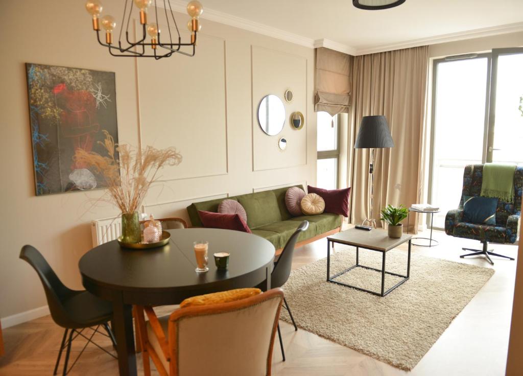 Posedenie v ubytovaní Apartament 53 Długie Ogrody Gdańsk