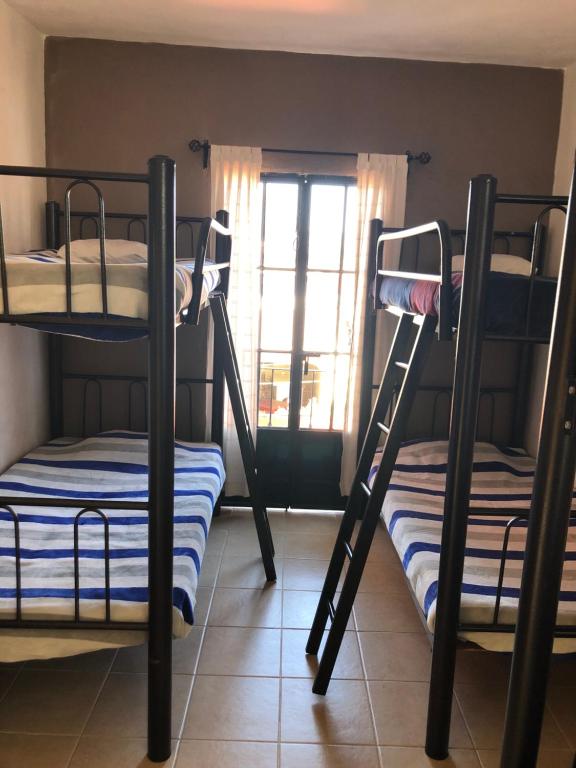 Postel nebo postele na pokoji v ubytování Hostel Inn