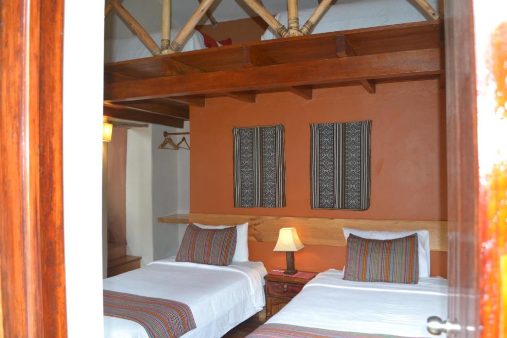 Postel nebo postele na pokoji v ubytování Miskiwasi Bed & Breakfast