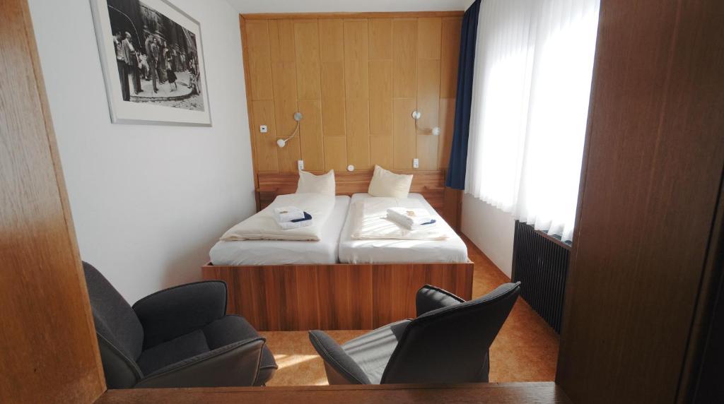 Postel nebo postele na pokoji v ubytování Hotel & Restaurant Druidenstein