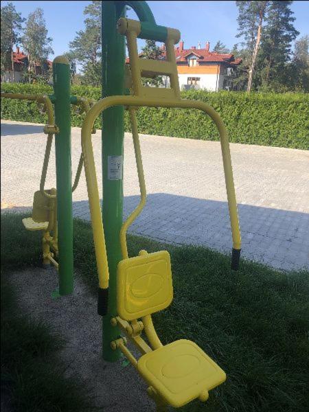Sân chơi trẻ em tại Ośrodek Wypoczynkowy Słońce Bobolin