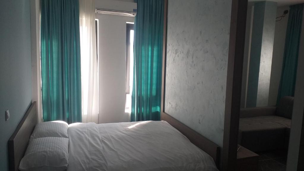 Postel nebo postele na pokoji v ubytování Dream House