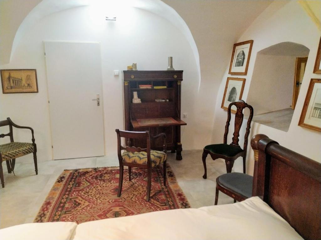 Postel nebo postele na pokoji v ubytování Chateau Třebešice