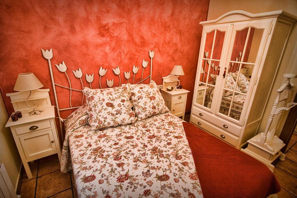 Postel nebo postele na pokoji v ubytování Casa Rural el Herrero de Pollos