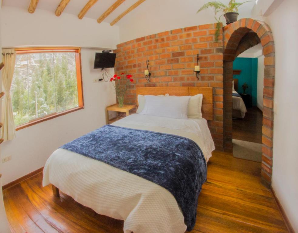 Postel nebo postele na pokoji v ubytování Parwa Guest House