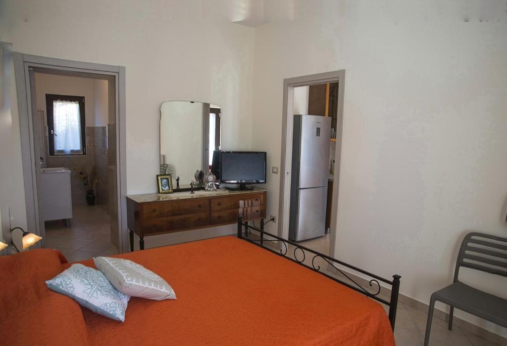 A bed or beds in a room at LE PITTURE casa di campagna