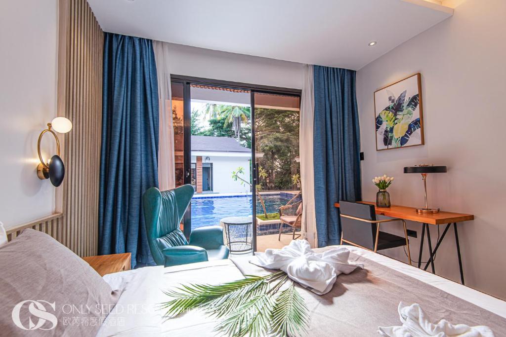 Postel nebo postele na pokoji v ubytování Only Seed Resort 欧芮希度假酒店