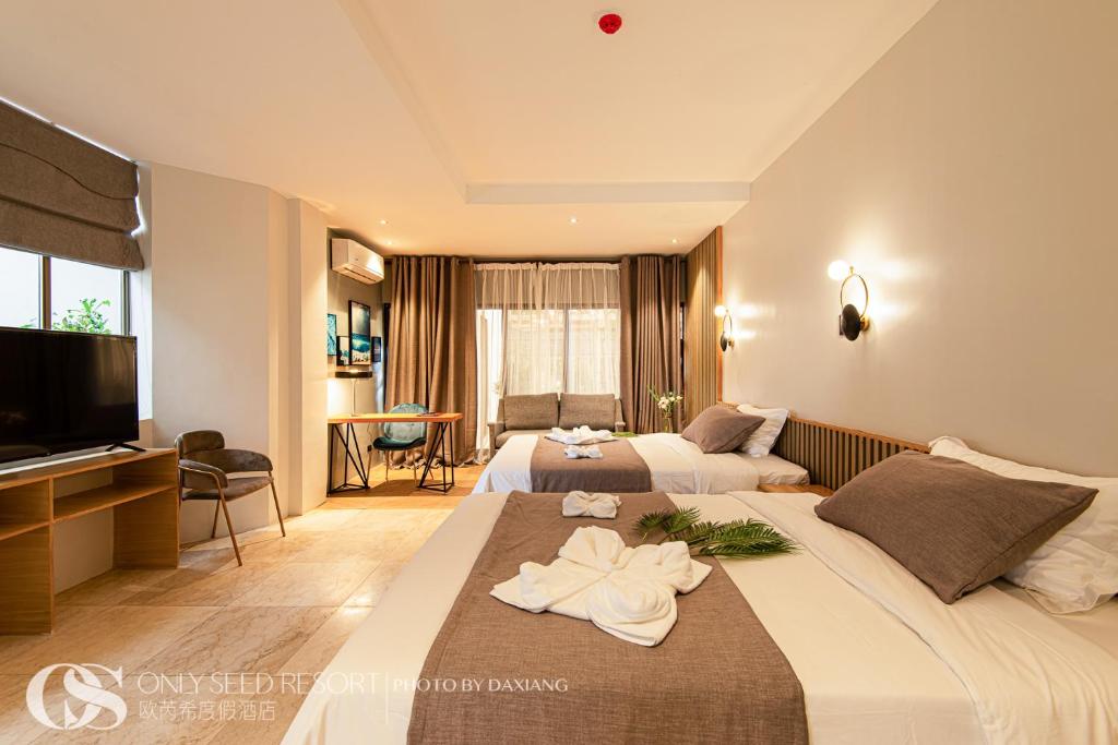 Postel nebo postele na pokoji v ubytování Only Seed Resort 欧芮希度假酒店