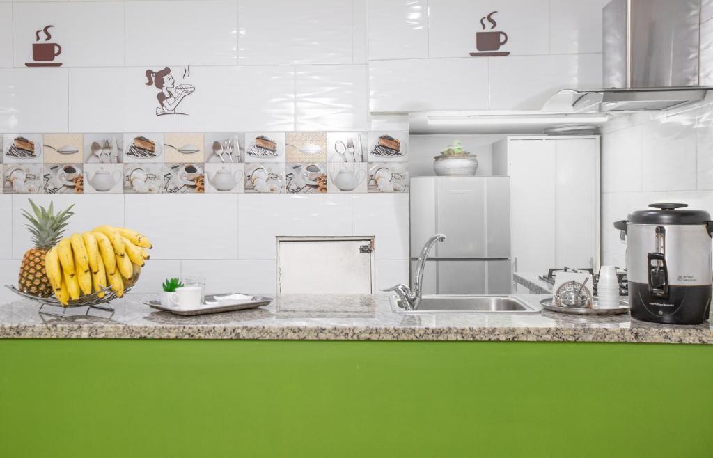 Kuchyň nebo kuchyňský kout v ubytování Hotel Casa Quinta Embajada
