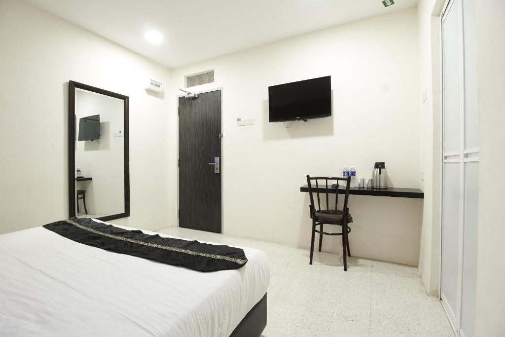 TV a/nebo společenská místnost v ubytování M S Hotel, Tengku Kelana KTM Klang