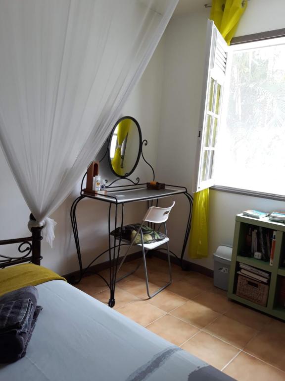 Postel nebo postele na pokoji v ubytování chambre et table d’hôte au Diamant