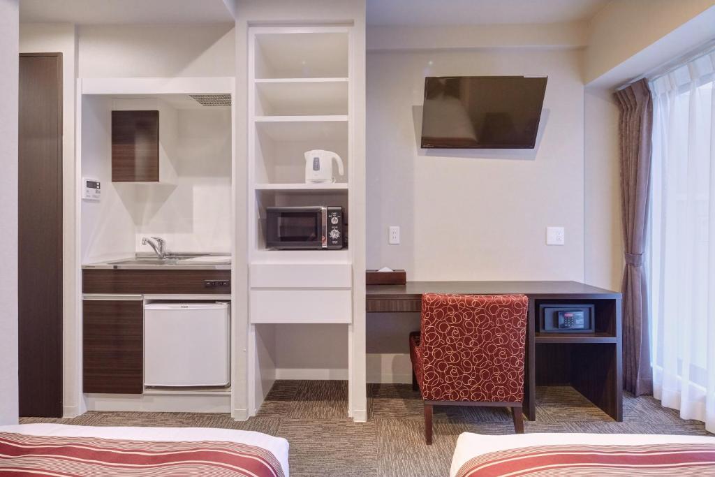 Kuchyň nebo kuchyňský kout v ubytování Hotel Amaterrace Yosuga