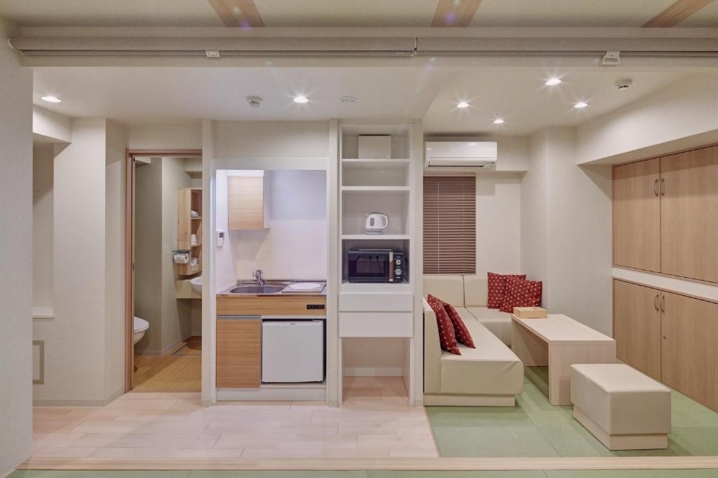 Kuchyň nebo kuchyňský kout v ubytování Hotel Amaterrace Yosuga