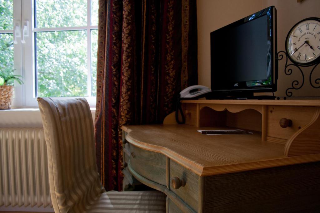 TV a/nebo společenská místnost v ubytování Gästehaus Eschment