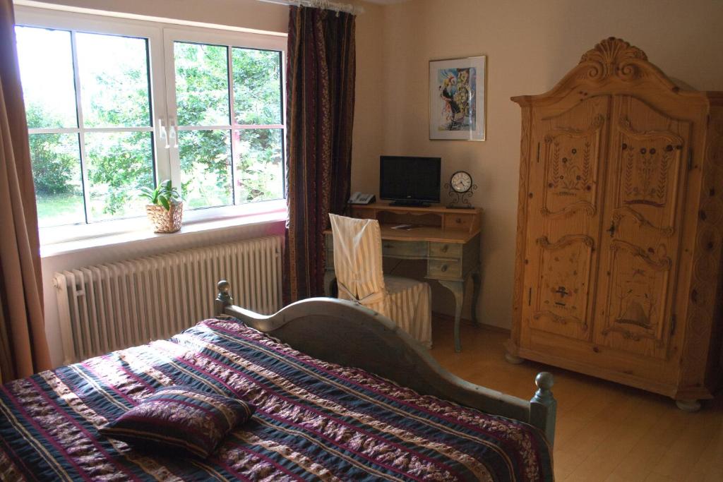 TV a/nebo společenská místnost v ubytování Gästehaus Eschment