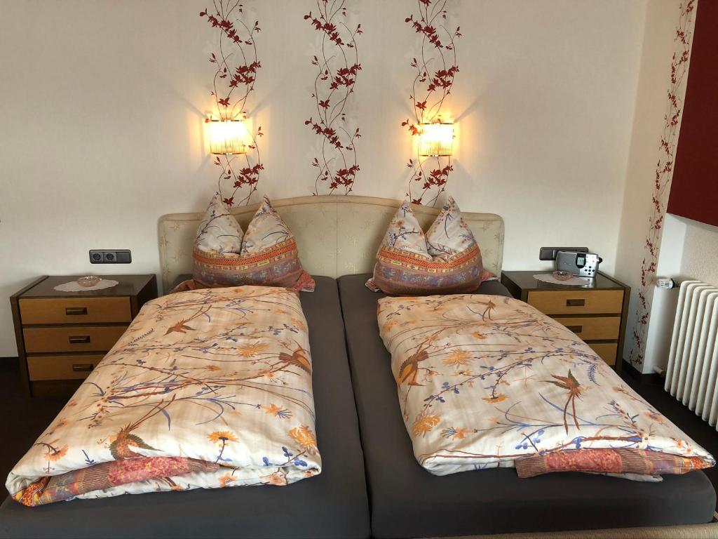 Postel nebo postele na pokoji v ubytování Haus Ingrid