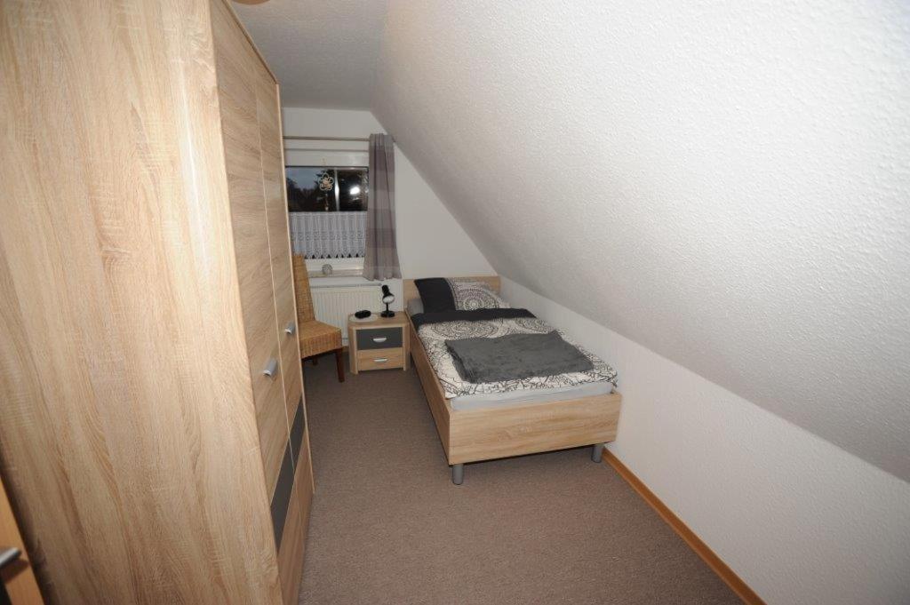 Postel nebo postele na pokoji v ubytování 5 Sterne Ferienhaus Von den Wilden Äckern