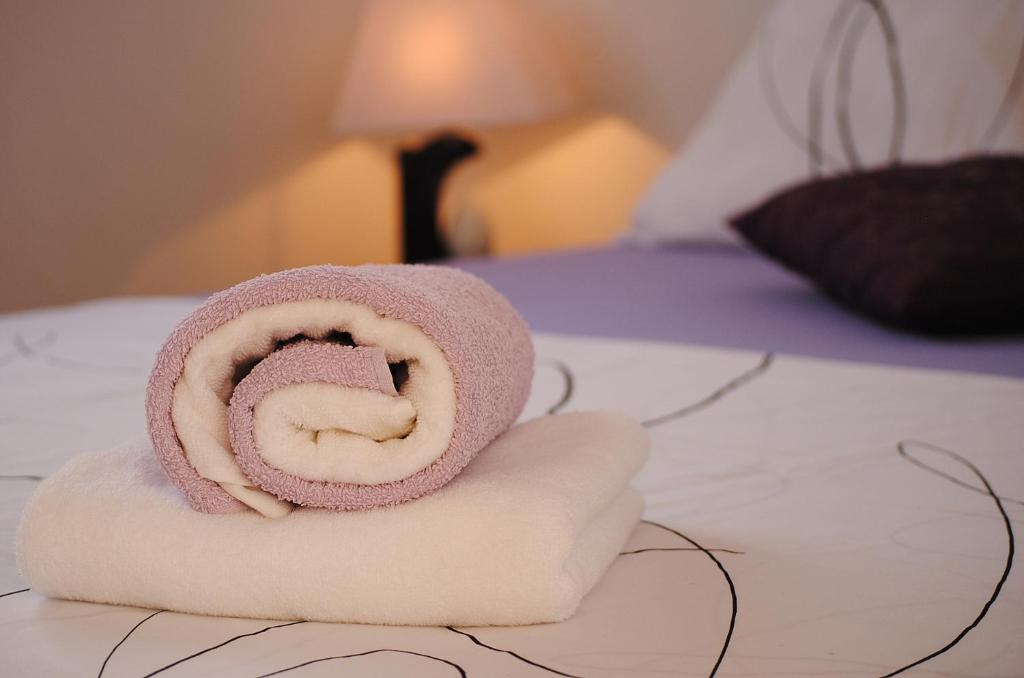 Posteľ alebo postele v izbe v ubytovaní Apartment NOEL