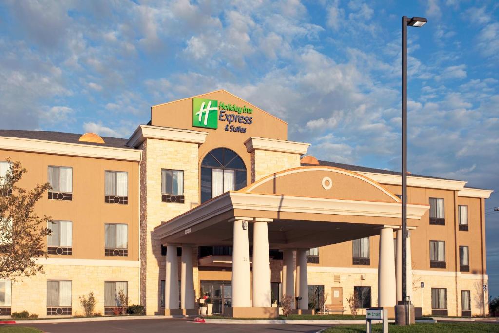 a hotel with a sign on the front of it at Holiday Inn Express Hotel & Suites Amarillo South, an IHG Hotel in Amarillo
