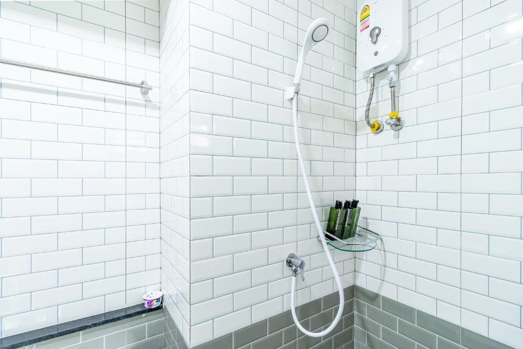 Koupelna v ubytování BeWish Residence Bangphlat
