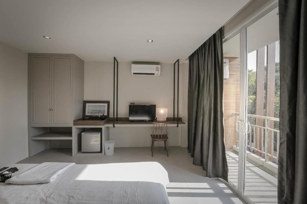 Voodi või voodid majutusasutuse Sugar Ohana Poshtel toas