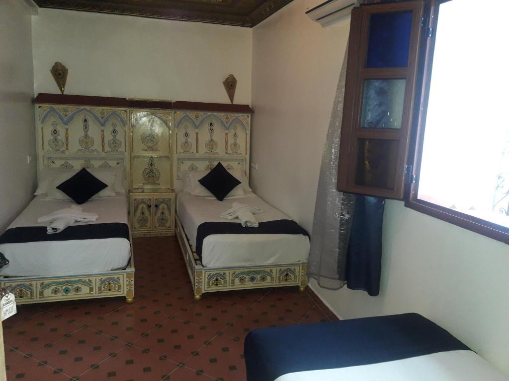 Postel nebo postele na pokoji v ubytování Casa El Haouta