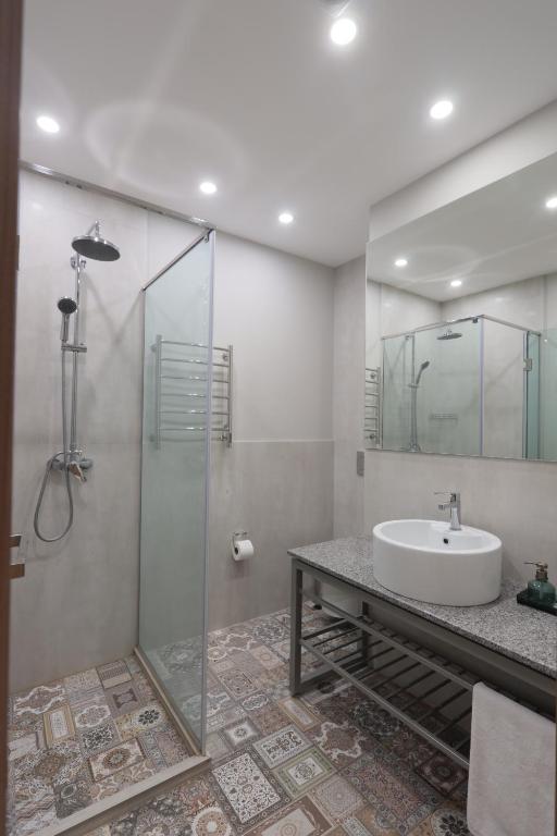 Koupelna v ubytování Andor Hotel