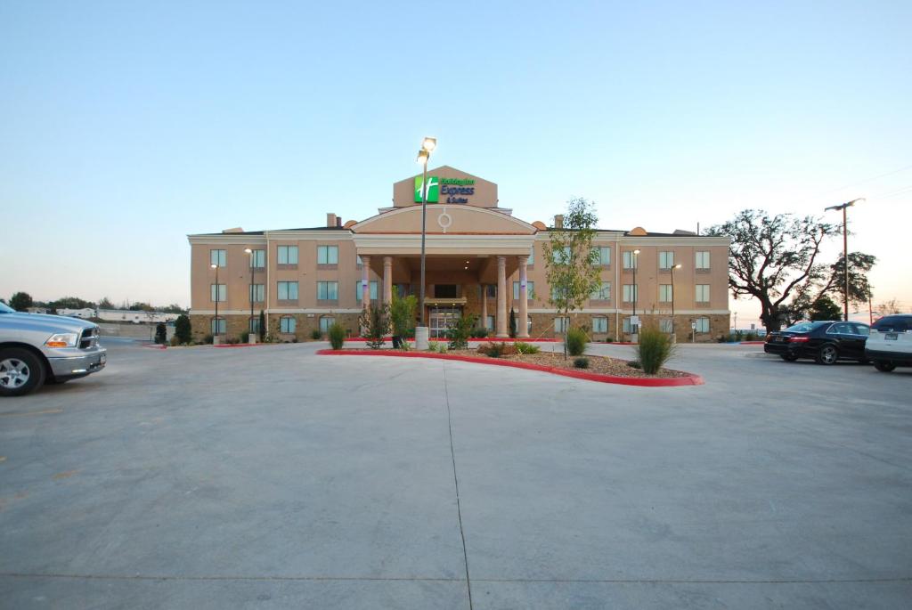 a large parking lot in front of a hotel at Holiday Inn Express & Suites Gonzales, an IHG Hotel in Gonzales